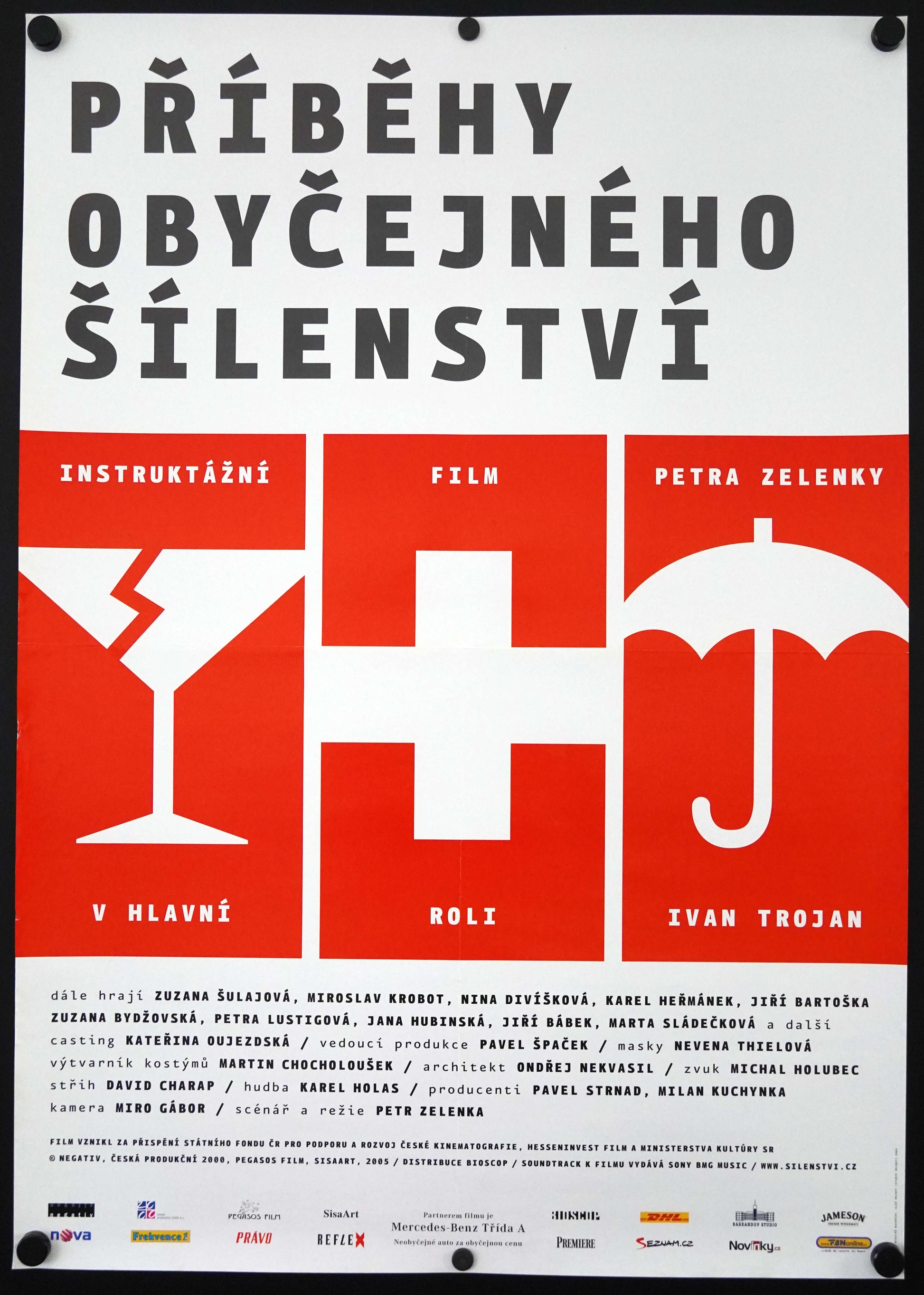 A red and white movie poster featuring graphical symbols and text for the Czech film 'Pribehy Obycejneho Silenstvi' with credits for the cast and crew.