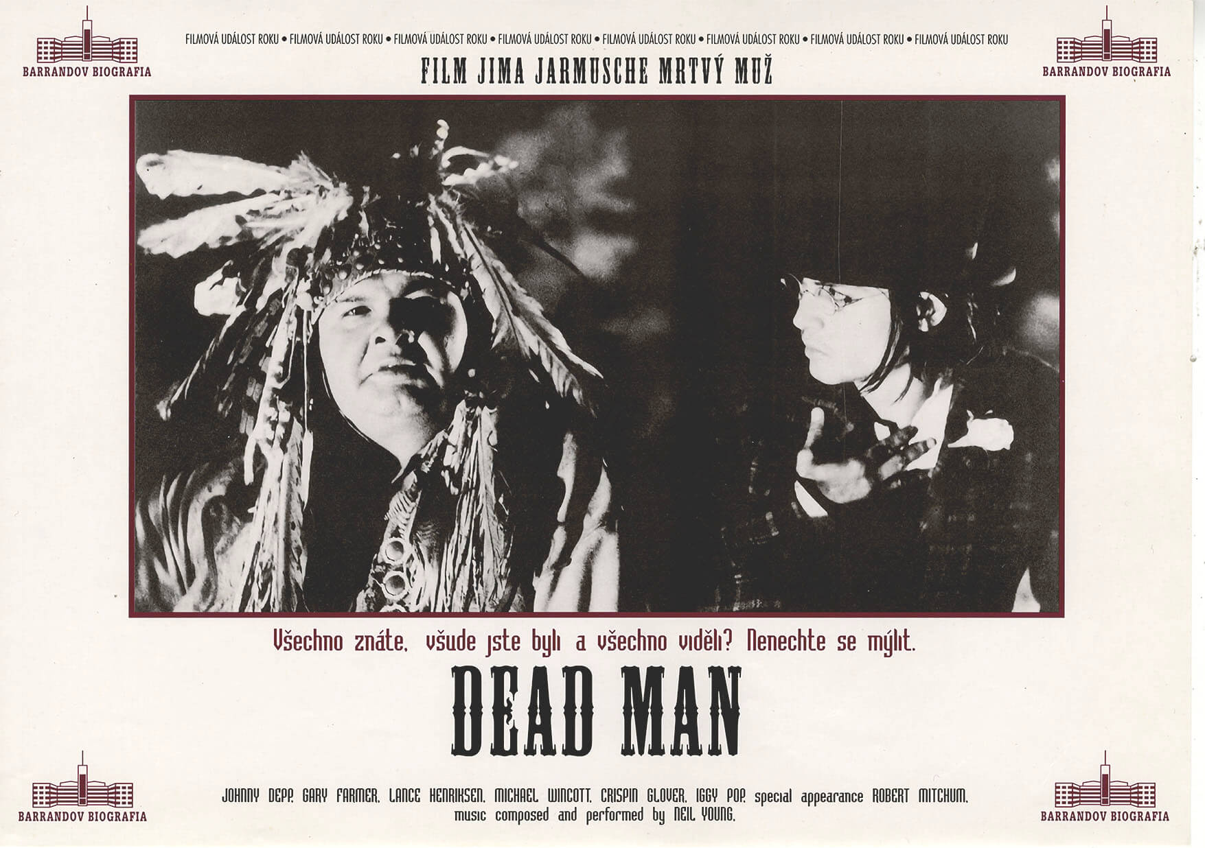 Johnny Depp talking with Nobody movie poster for Dead Man